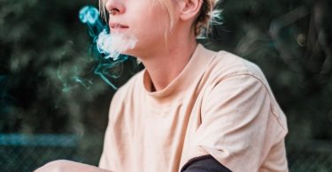 woman smoking outdoors